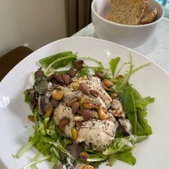 A picture of Baby leaf salad with smoked chicken breast.