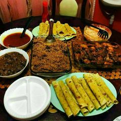 A picture of Chapati, Pilau, Deep Fried Chicken, Fried Liver, Tomato Soup.