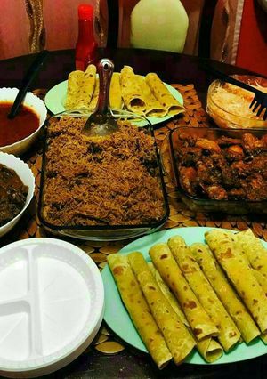 A picture of Chapati, Pilau, Deep Fried Chicken, Fried Liver, Tomato Soup.