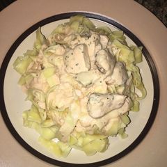 A picture of Egg pasta with creamy rose sauce.