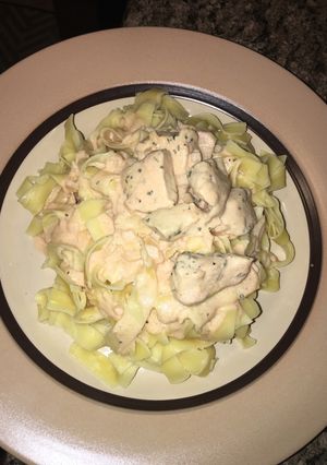 A picture of Egg pasta with creamy rose sauce.
