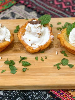 A picture of Churros ice cream cups.