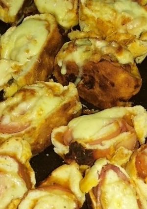 Una foto de Rollitos de pizza casera