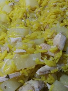 Una foto de Arroz con restos de pollo asado