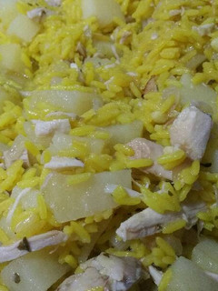 Una foto de Arroz con restos de pollo asado