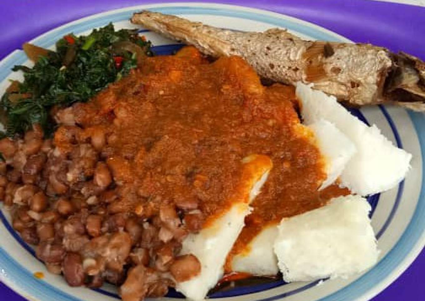 Yam and beans with vegetables stew and fish