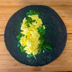 A picture of Scrambled Eggs and Rocket Wrap.