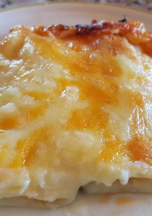 Una foto de Canelones de atún con tomate y bechamel de patata