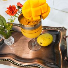 A picture of Mango juice with black pepper.
