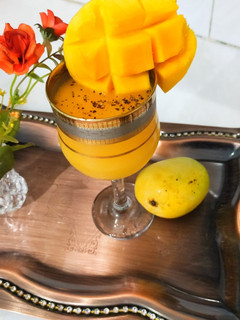 A picture of Mango juice with black pepper.