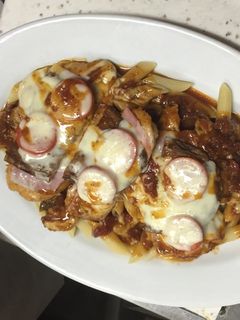 Una foto de Pollo con queso y jamón