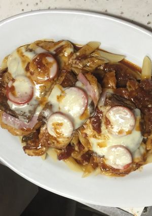 Una foto de Pollo con queso y jamón