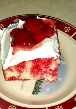 A picture of EASY strawberry poke cake.