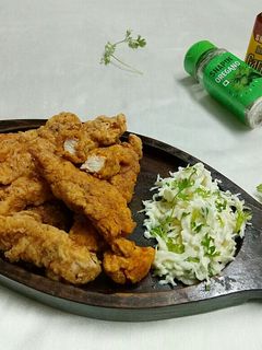 A picture of KFC style chicken tenders.