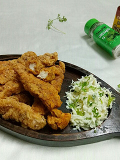 A picture of KFC style chicken tenders.
