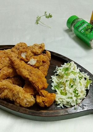 A picture of KFC style chicken tenders.