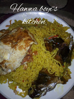 A picture of Indomie and Egg with Titus.