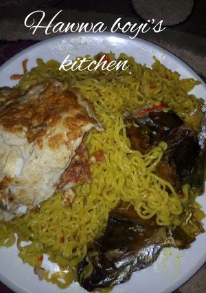 A picture of Indomie and Egg with Titus.