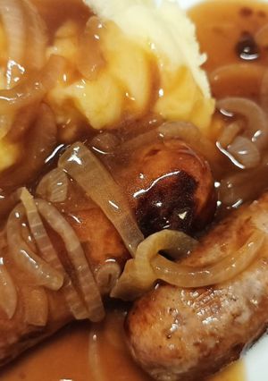 A picture of Bangers, mash n onion gravy.