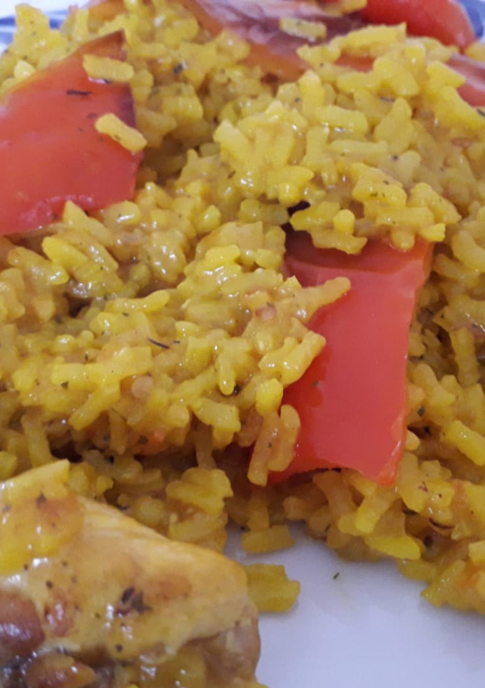 Una foto de Arroz y pollo