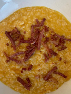Foto di Risotto con la zucca e speck croccante