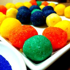 A picture of Holi special colorful coconut ladoo.