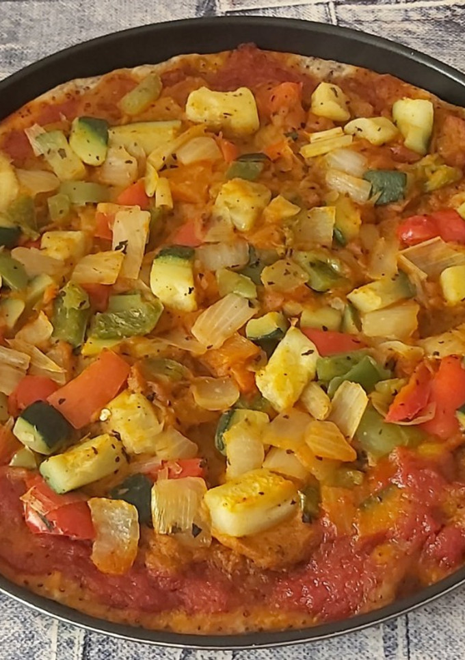 Una foto de Pizza vegana a la jardinera 🍕💯💚😋