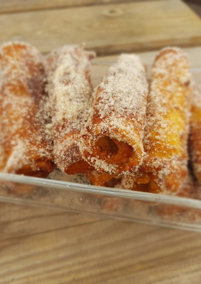 Una foto de Canutillos de torrijas con Nutella
