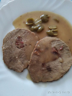 Una foto de Carne mechada con aceitunas