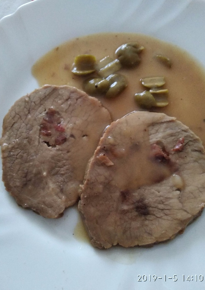 Una foto de Carne mechada con aceitunas