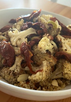 A picture of Roasted zaatar cauliflower and bulgur salad with tahini dressing.
