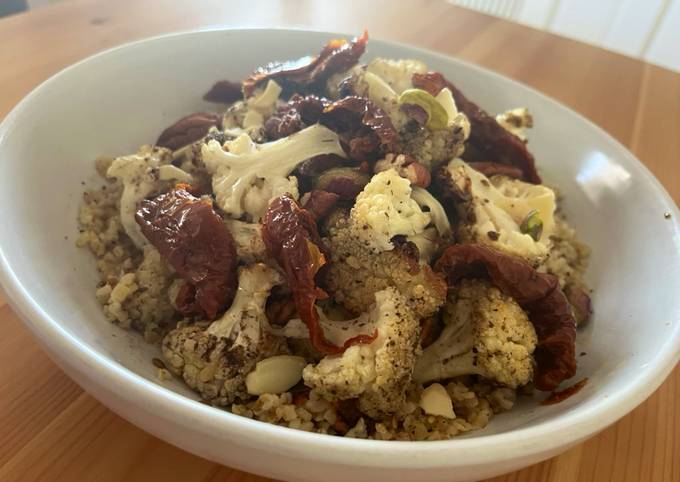 Roasted zaatar cauliflower and bulgur salad with tahini dressing