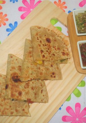 A picture of Sweet Corn and Paneer Quesadillas with Salsa and Guacamole.