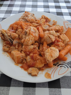Una foto de Pollo en salsa napolitana