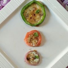 Eggs in Onion Capsicum Tomato Ring A picture of Eggs in Onion Capsicum Tomato Ring.