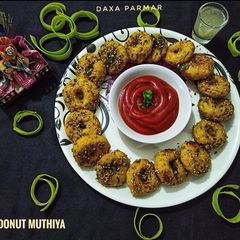 Lauki Donut Muthiya (Gujarati Muthiya) A picture of Lauki Donut Muthiya (Gujarati Muthiya).