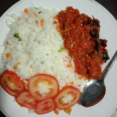 A picture of White Rice and catfish stew.