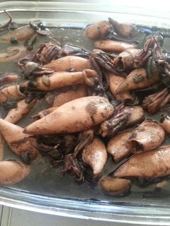 Una foto de Chipirones en su tinta