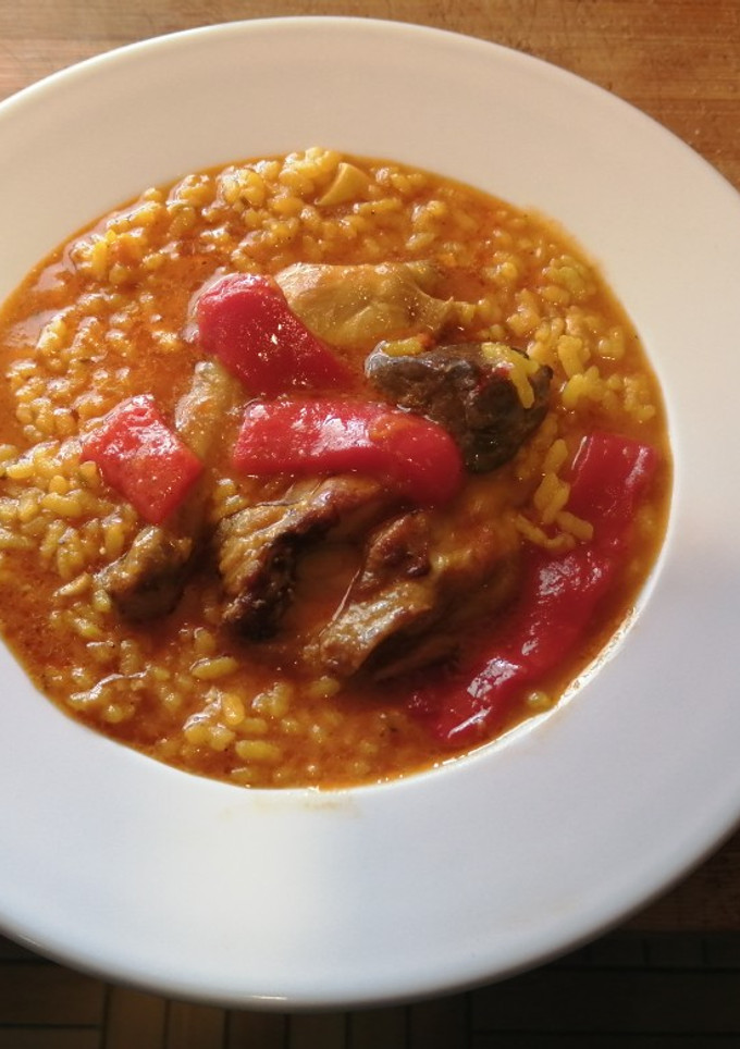 Una foto de Arroz caldoso con conejo y un toque andalusi