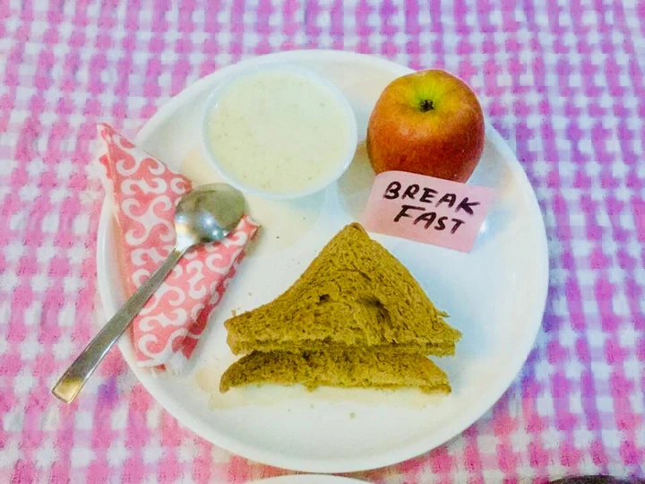 Easy Steps to Prepare #Wheat bread-peanut butter toast,dry fruits porridge and an Apple the Delicious Can spoil the tongue