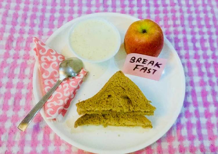 #Wheat bread-peanut butter toast,dry fruits porridge and an Apple