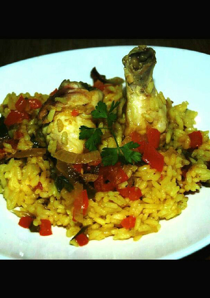 Una foto de Arroz con pollo 🍴