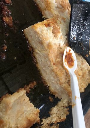Una foto de Budín de pan y coco