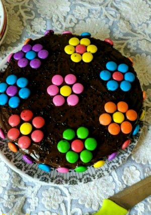 A picture of Eggless Gems Chocolate Cake.