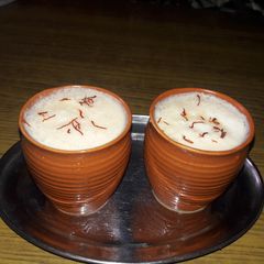 A picture of Kesar lassi with Kulhad.