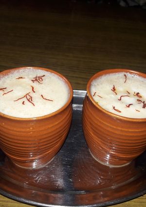 A picture of Kesar lassi with Kulhad.