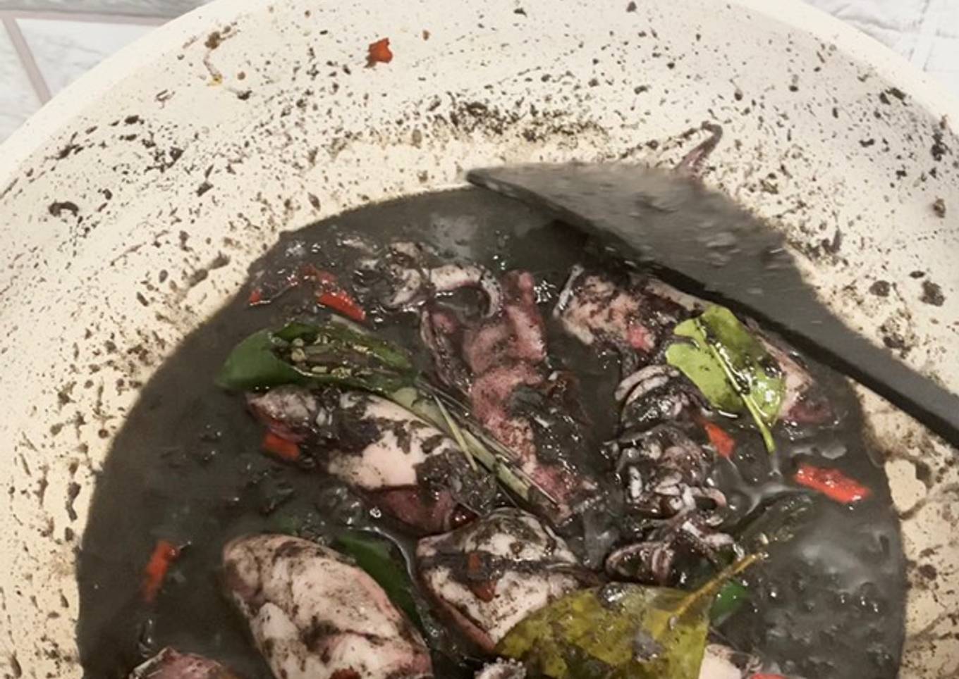 Cor preta para cozinhar lula