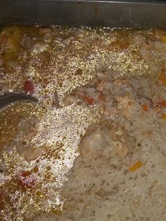 Una foto de Guiso de arroz con pollo