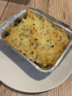 Una foto de Pastel de patata con verduras y carne picada al horno
