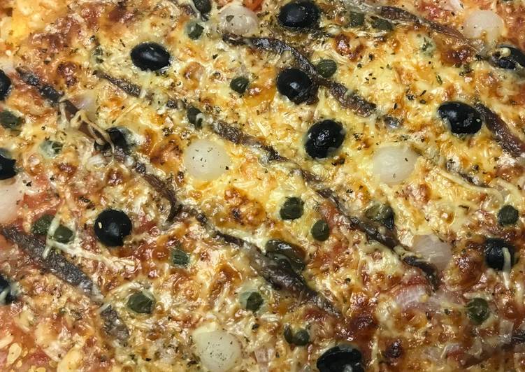 Pizza de anchoas y encurtidos Receta de Francesc Cookpad